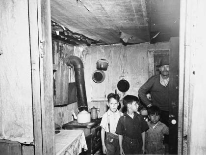 M.S. Siegel photograph of the interior of a residence for the Los Angeles Bureau of Housing and Sanitation, 1938, Poor Housing Conditions in Los Angeles Scrapbook